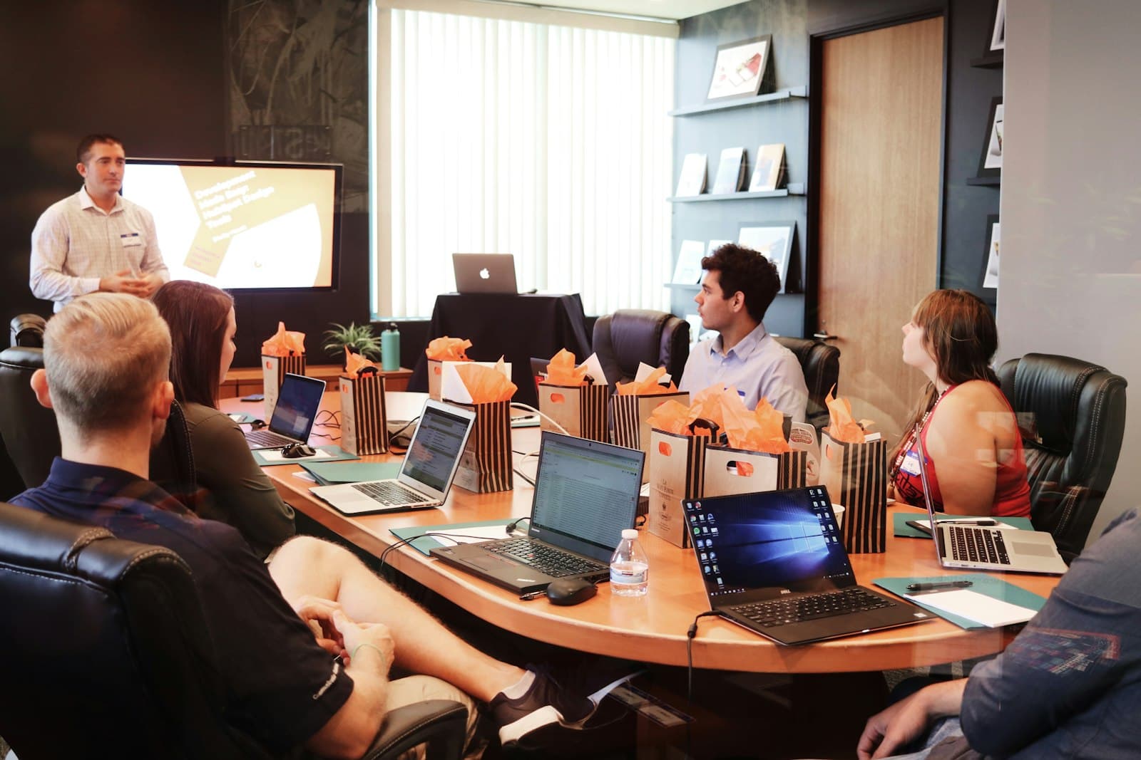 A business team in a meeting around a conference table
